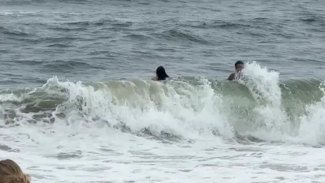 Video thumbnail for Off-duty lifeguards rescue five people at Robert Moses State Park