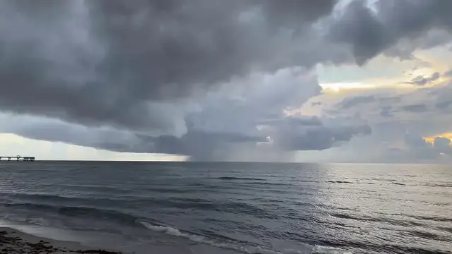 Video thumbnail for US: Storm Clouds and Rainfall Over The Sea in Dania Beach.