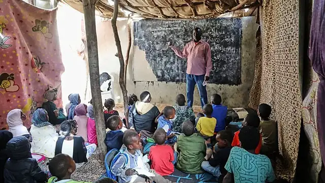 Video thumbnail for Refugee teacher fights to keep education alive for children displaced by Sudan's war