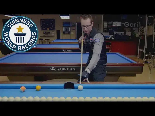 Video thumbnail for Jump shot tutorial: Record-breaking pool trick shot star Florian Kohler shows you how!