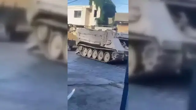 Video thumbnail for Lebanon: Lebanese Army Removes Israeli Tank in Southeren Lebanon.