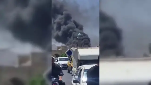 Video thumbnail for Iran: Fire Breaks Out At Iranian Holy Shrine.