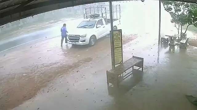 Video thumbnail for Vehicle Rolls Backward in Rain Before Driver Stops It in Sisaket