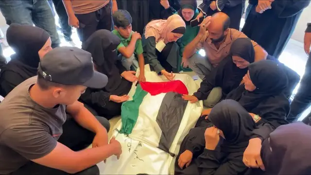 Video thumbnail for Funeral held in Khan Younis for Palestinian killed in beachfront drone strike.