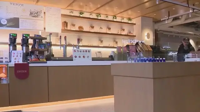 'Video thumbnail for Why banks and retailers are opening coffee shops in NYC'