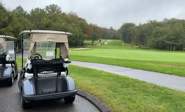 Video thumbnail for Golfers brave rainy weather for St. Anthony's annual fundraiser