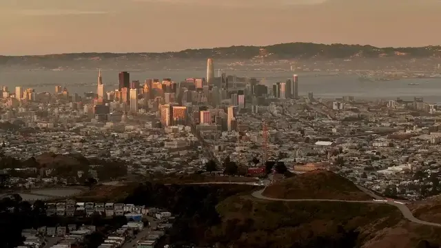Video thumbnail for US: DRONE - Clouds and sunset create scenic views over San Francisco.