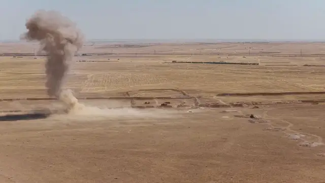 Video thumbnail for Syria: Drone captures Syrian teams destroy mines left by YPG near Raqqa.