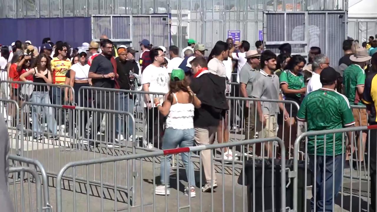 Video thumbnail for US: Fans pass through SoFi Stadium gates ahead of Iran-New Zealand World Cup match.
