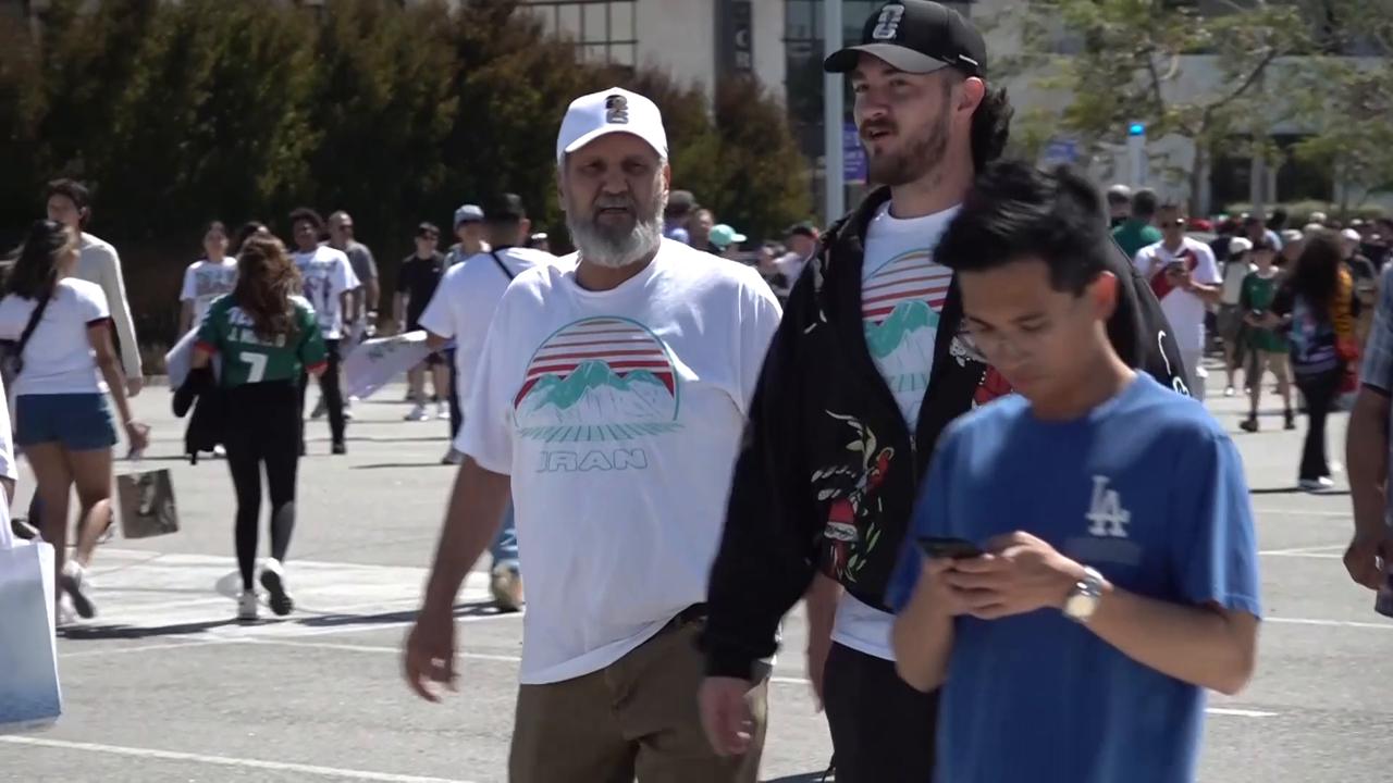 Video thumbnail for US: Fans gather outside SoFi Stadium ahead of Iran-New Zealand World Cup match.