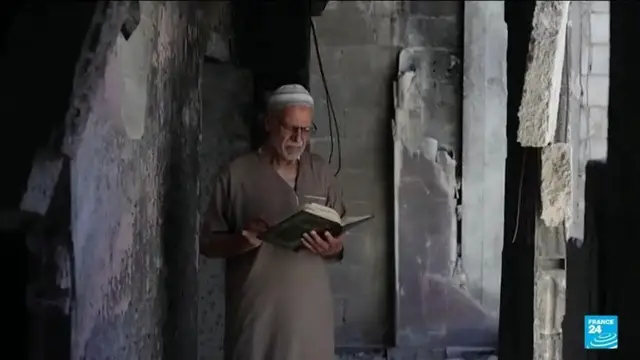 Video thumbnail for Syrian man reunited with secret library hidden for 15 years