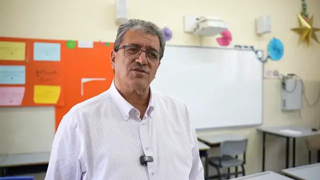 Video thumbnail for Christian school official says strike in East Jerusalem to continue over Israeli entry restrictions.