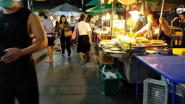 Video thumbnail for Feasting on Singapore's Tastiest Hawker Food – You Won't Believe What We Tried!
