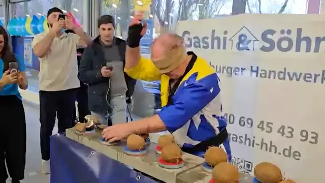 Video thumbnail for Man nicknamed Hammerhands breaks coconuts blindfolded