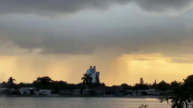 Video thumbnail for US: Heavy downpour during sunset time in Hollywood, FL.