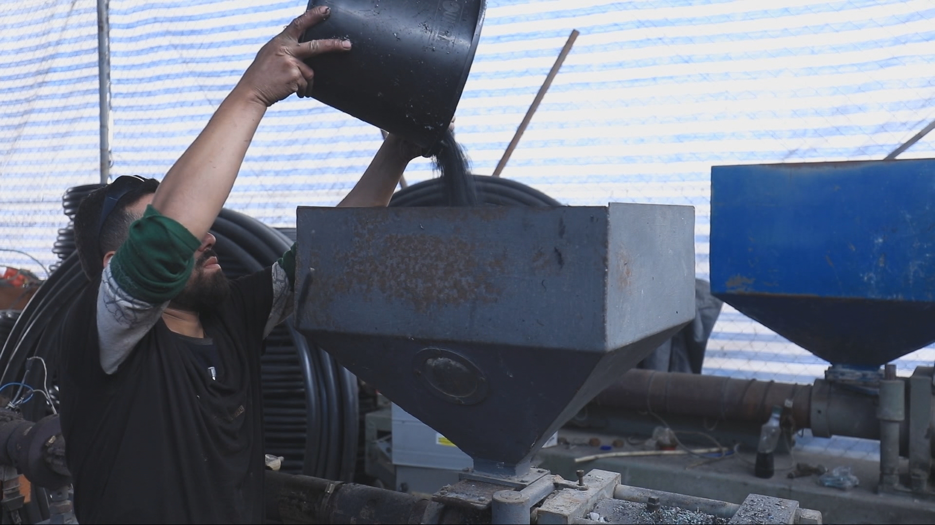 Video thumbnail for Gaza recycles plastic waste into water hoses amid supply shortages