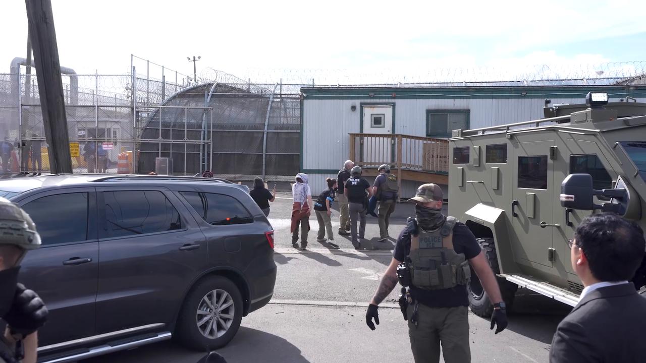 Video thumbnail for US: ICE agents use pepper spray during clashes outside Delaney Hall.