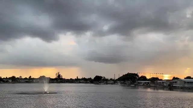 Video thumbnail for US: Dramatic Storm Clouds Fill The Sky During Sunset in Dania Beach, FL.
