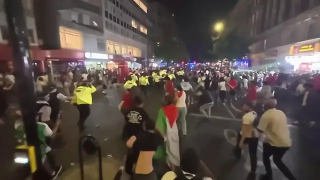 Video thumbnail for UK: Moroccan fans rioted in London after their team lost to France.
