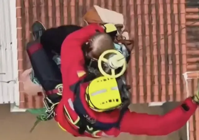 Video thumbnail for Residents hoisted from rooftops amid Spain’s deadly flooding