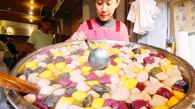 'Video thumbnail for STRANGE Street Food in Jiufen, Taiwan (九份)! SUPER CHEWY Taiwanese Street Food tour + STINKY TOFU'