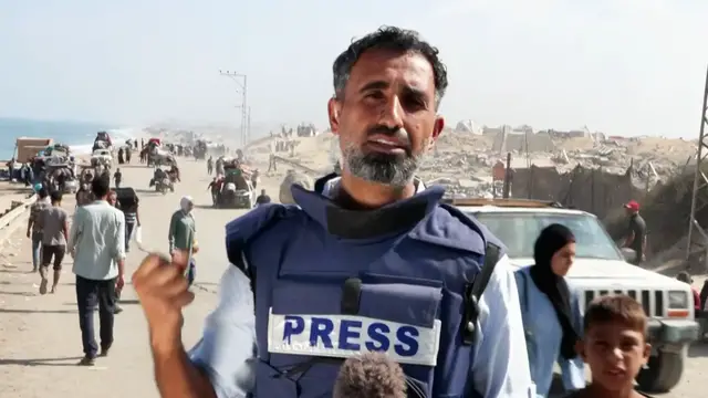'Video thumbnail for Al Jazeera reporter on road out of Gaza City as thousands flee'