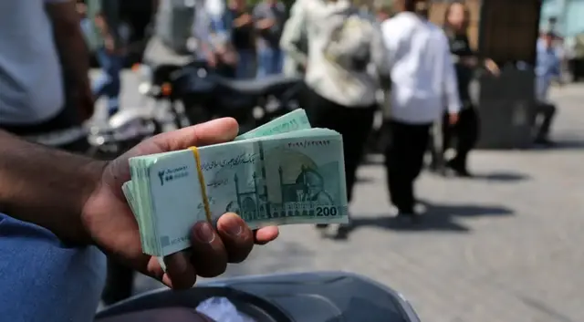Video thumbnail for Iranian rial hits new low as US sanctions pile pressure on economy