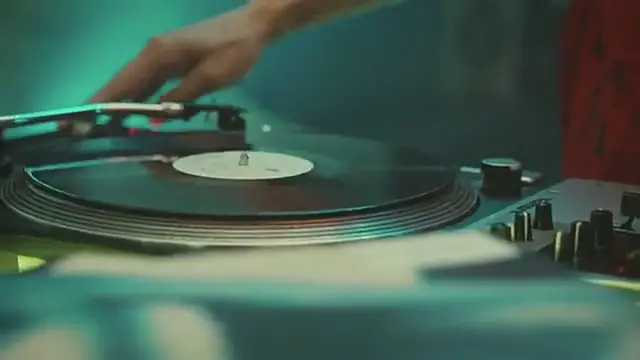 'Video thumbnail for Person Playing on an Older Vinyl Deck'