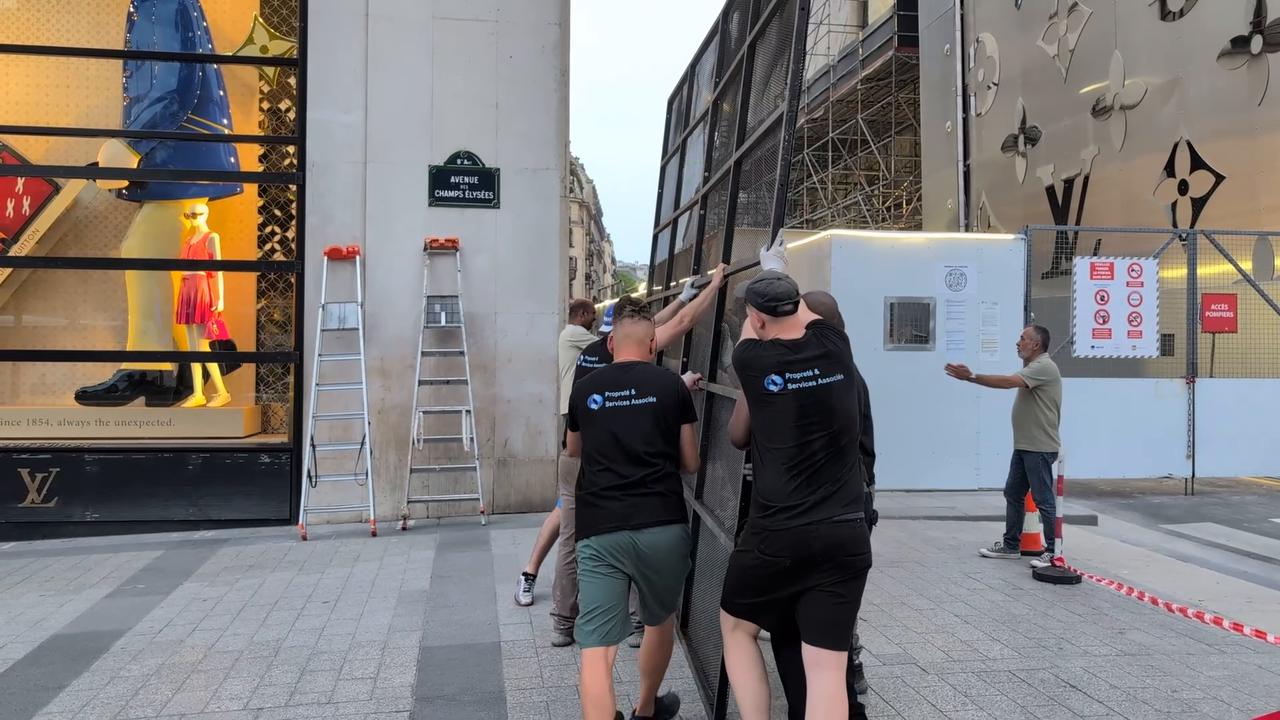 Video thumbnail for France: Shops on Champs-Elysees barricaded ahead of Champions League final.