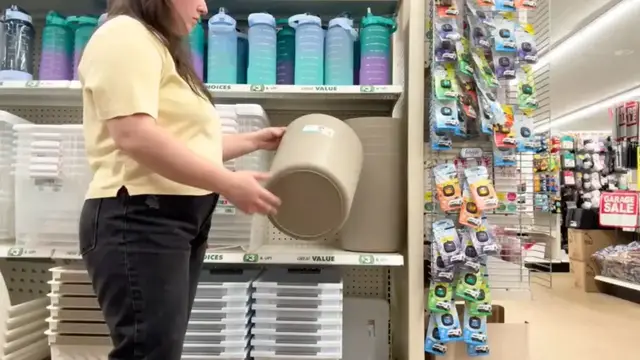 'Video thumbnail for Everyone will be buying Dollar Store trash cans after seeing this GENIUS living room idea!'