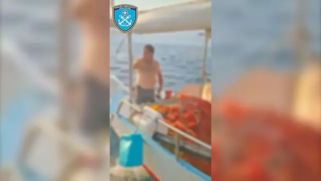 Video thumbnail for Greece: Greek Coast Guard evacuates dozens by sea as wildfire burns near Crete coastline.
