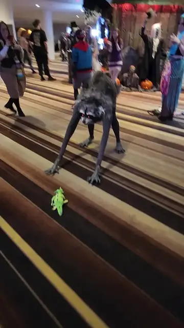 Video thumbnail for Creepy Jimothy Creature Costume Meets Tiny Green Dinosaur