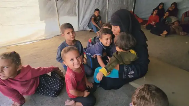 'Video thumbnail for Palestinian couple in Gaza step in to raise 36 orphaned grandchildren'