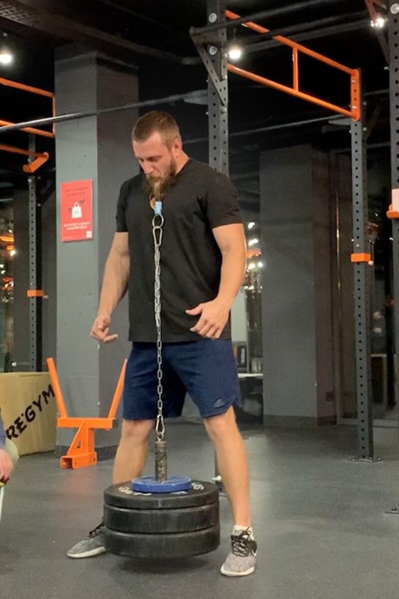 Video thumbnail for Heaviest weight lifted by a beard  64.60 kg (141 lb 15.6 oz) by  Dmytro Hrunskyi