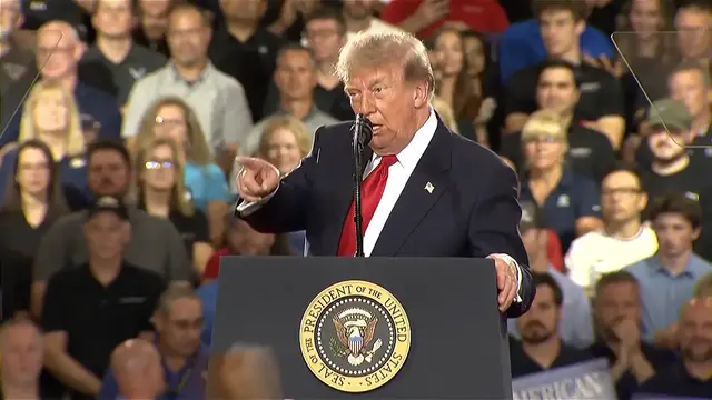 Video thumbnail for Trump calls protester ‘communist’ after Michigan speech interruption