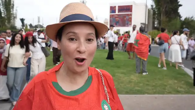 Video thumbnail for Morocco: Morocco fans celebrate Canada win after watching match on giant screen (2).
