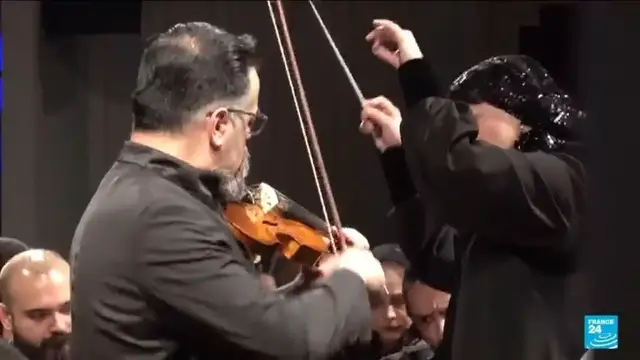 'Video thumbnail for Iran's first woman conductor leads Tehran Symphony Orchestra'