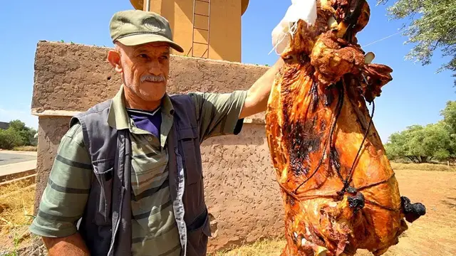 'Video thumbnail for Morocco Village Food - BERBER PIT ROAST LAMB in Imlil! Eating NORTH AFRICAN Food in Morocco!!'
