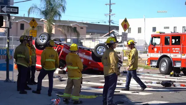 Video thumbnail for US, Los Angeles: Broadway-Manchester Fire Vehicle Overturned Involved in Traffic Collision.