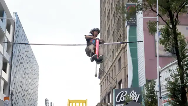 Video thumbnail for Highest forward flip pogo stick jump 3.35 metres (11 ft) by Henry Cabelus