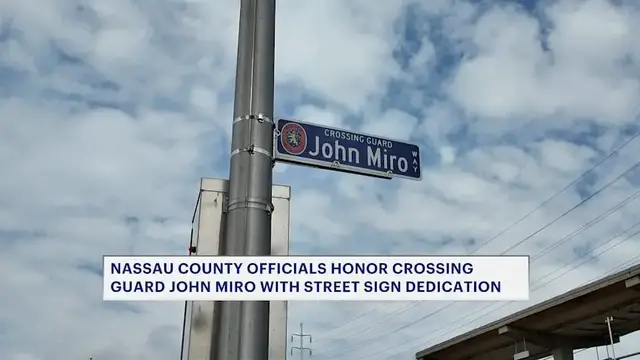 Video thumbnail for Merrick honors fallen crossing guard with street sign dedication
