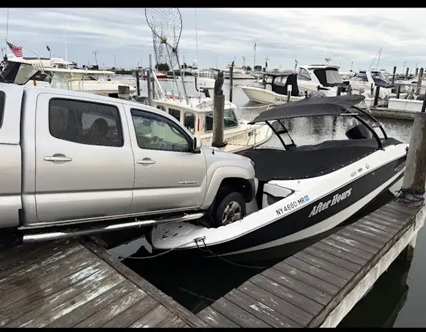 Video thumbnail for Truck drives onto boat at Bay Shore marina