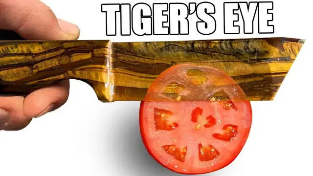 'Video thumbnail for Waterjet Channel: making impossible knives: mammoth tooth vs tiger's eye'