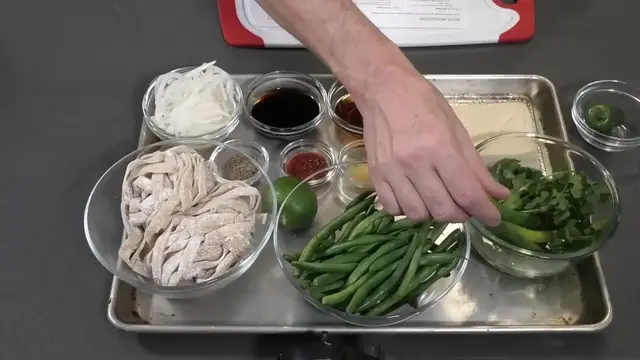 'Video thumbnail for Spicy Cumin Fried Noodles with Tofu & Green Beans'