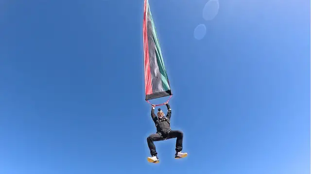 Video thumbnail for Longest party streamer used in a freefall - 101 metres (331.36 ft) by Skydive Benghazi