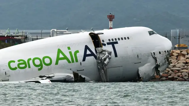 'Video thumbnail for Two killed as cargo plane skids off Hong Kong runway'