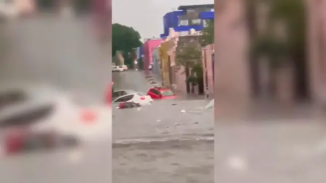Video thumbnail for Mexico: Torrential rain leaves vehicles submerged as flooding hits Puebla.