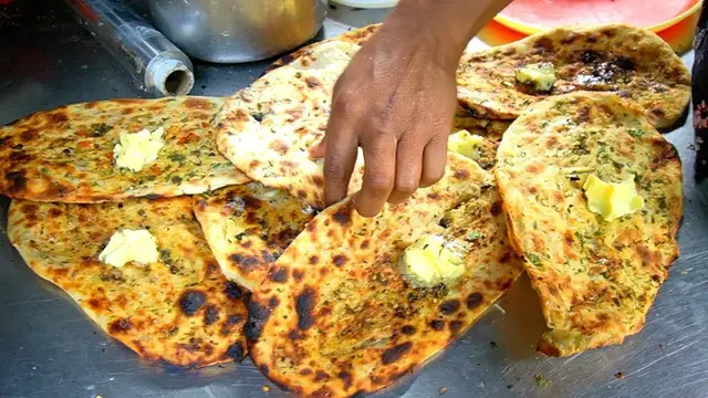 'Video thumbnail for KULCHA KING of PUNJAB - Pakistani Food in India!! BEST Indian Street Food in Amritsar, India'