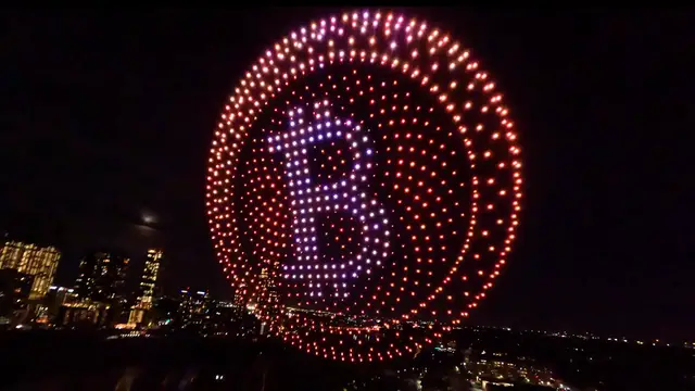 Video thumbnail for Sky Elements drone displays shows largest currency symbol
