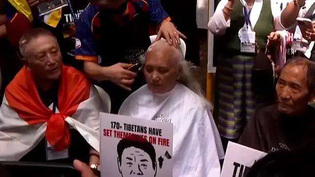 Video thumbnail for Hundreds of Tibetans protest China’s ethnic unity law by shaving heads